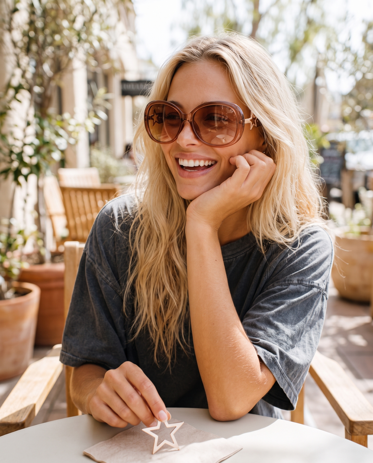 Lexi in the star sunglasses - tea